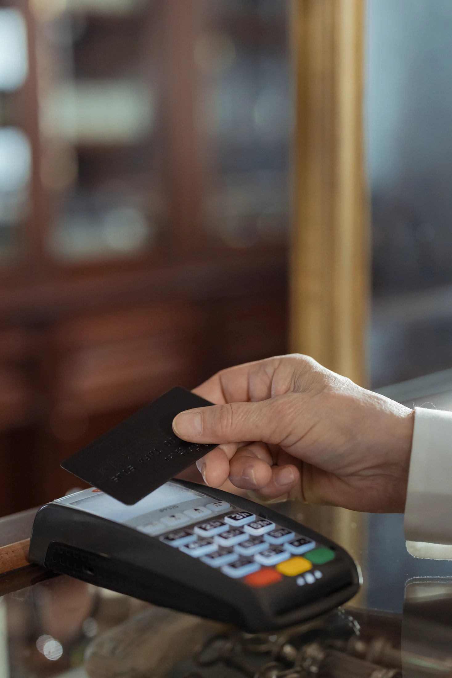 A customer making a contactless card payment